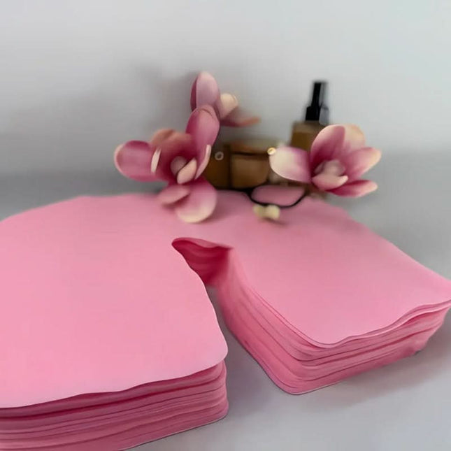 Silk Y vienkartiniai rožiniai neaustiniai masažo stalo veido angos uždangalai, 100 vnt.