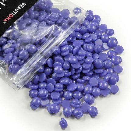 Kietasis depiliacijos vaškas granulėmis PURPLE, 100 g paketas su violetinėmis vaškinėmis granulėmis